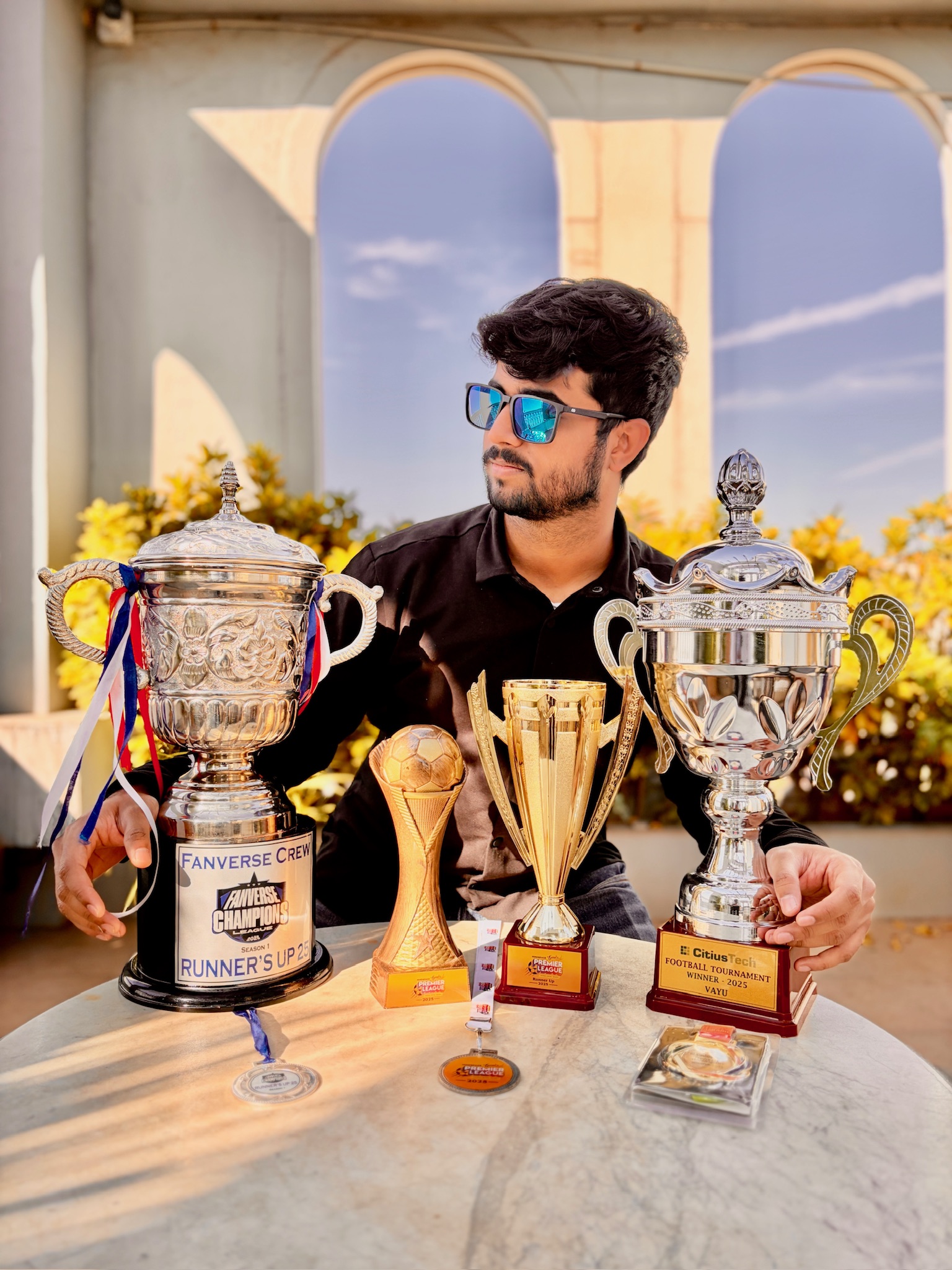 Coach Swapnil with Trophies